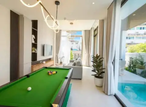 3 Bedroom House for Rent in Central Pattaya games room with pool table overlooking outdoor pool