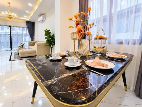 3 Bedroom Townhouse for Rent in Central Pattaya marble dining table set with fruit display and floral decor