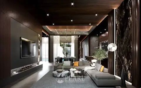 Reservoir Town open-plan living and dining area with modern lighting, large windows, and outdoor view.