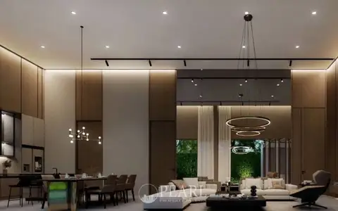 Baan Mae Residence 69 open-plan living and dining area with modern decor, pool view, and integrated kitchen.