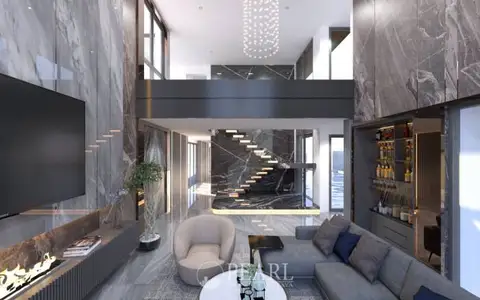 Alicera Ville luxurious living room with a large TV, fireplace, marble walls, and a grand staircase.