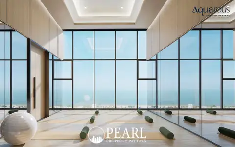 2 Bedroom Condo for Sale at Aquarous Jomtien Pattaya fitness center with modern gym equipment and ocean view