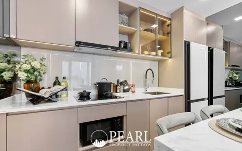 2 Bedroom Condo for Sale at Aquarous Jomtien Pattaya modern kitchen with built-in appliances and cabinetry