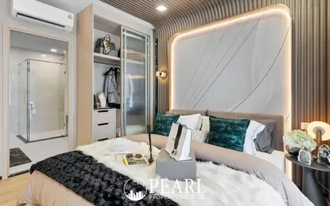 2 Bedroom Condo for Sale at Aquarous Jomtien Pattaya bedroom with built-in wardrobe and ensuite shower view