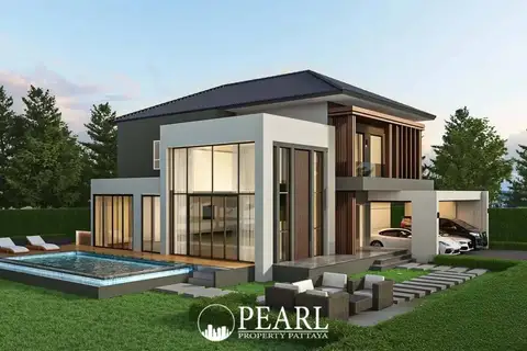 Horseshoe Point modern condo exterior with a rectangular pool, outdoor seating, and carport.