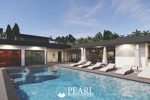 Siam Royal View Lakeside large outdoor swimming pool with lounge chairs, umbrellas, and modern architecture.