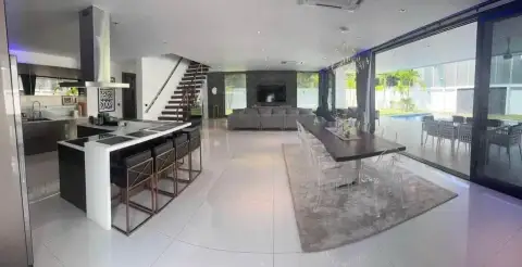 7 Bedroom House for Sale & Rent in Pratumnak Hill open-plan kitchen, dining and living space with staircase and pool access