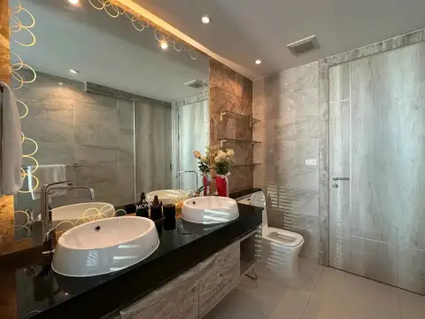 2 Bedroom Condo for Rent at Riviera Monaco bathroom with double vessel sinks and marble countertop