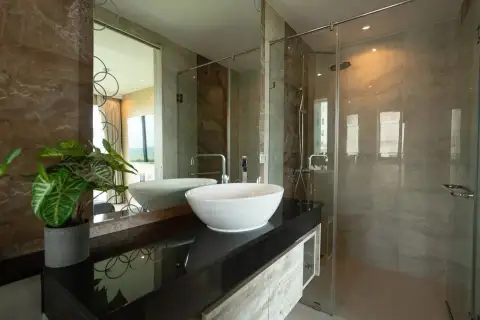 2 Bedroom Condo for Sale at Riviera Monaco bathroom with dual vessel sinks and glass shower