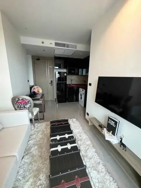 1 Bedroom Condo for Rent at Riviera Ocean Drive open-plan living area with kitchen and dining nook