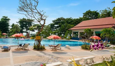 View Talay 3A poolside lounge area with sun loungers, umbrellas and covered pavilion