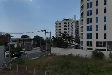 1 Bedroom Condo for Sale at Sea Sky By Sand street view of neighboring buildings and tropical surroundings in Pattaya
