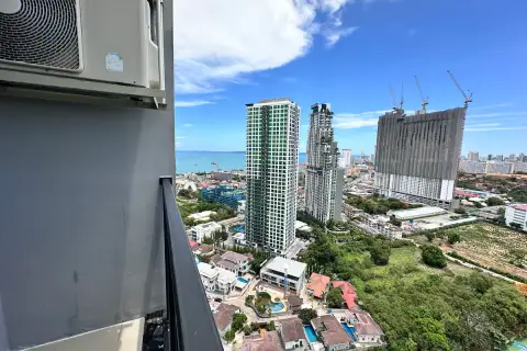 2 Bedroom Condo for Sale at The Twin Tower Jomtien Beach Pattaya balcony view of Jomtien skyline with high-rise towers and sea in the distance