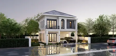 Spring Town Pool Villa Pattaya exterior view of two modern houses with gray and white facades under a blue sky.