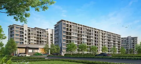 G Condo Sriracha exterior view of multiple mid-rise residential buildings with landscaped grounds