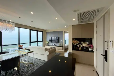 2 Bedroom Condo for Sale at The Panora Pattaya 2 Bedroom Condo for Sea at The Panora Pattaya kitchen island overlooking living area and entryway with floral decor