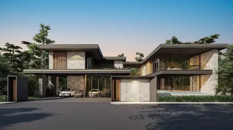 The Scenevanar modern condo complex entrance with a security gate, sleek architecture, and dense green landscaping.
