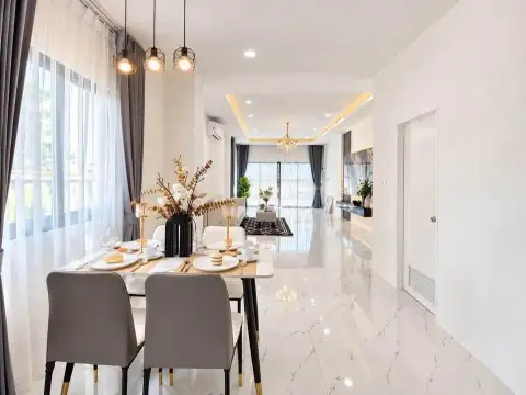 3 Bedroom Townhouse for Rent in East Pattaya dining area with marble table overlooking open living space
