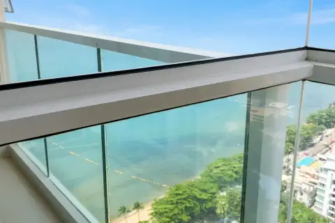 1 Bedroom Condo for Sale at Cetus Beachfront glass balcony railing with direct beachfront and turquoise sea view