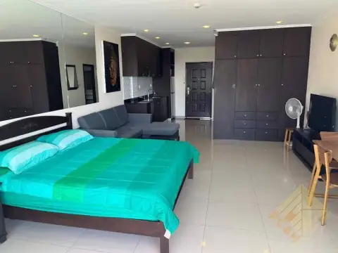 1 Bedroom Condo for Sale at View Talay 7 open-plan bedroom with kitchenette, sofa and wardrobe storage