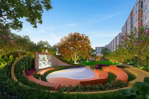 Dcondo Vale Sriracha outdoor amphitheater and garden lawn with projector screen near residential towers