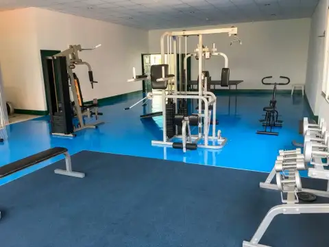 Wongamat Garden Beach Resort on-site fitness center with gym equipment and weights