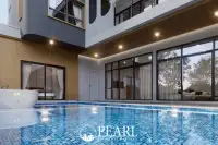 5 Bedroom House for Sale in Myroom Pool Villa master bedroom with ensuite bathroom