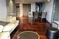 2 Bedroom Condo for Sale at The Senate Residences spacious open-plan living and dining area with polished hardwood floors and kitchen
