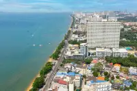 3 Bedroom Condo for Sale at Cetus Beachfront aerial view of Pattaya beachfront with sandy shore turquoise sea and city skyline
