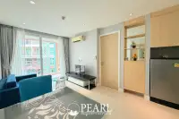 1 Bedroom Condo for Sale in Grande Caribbean spacious living room with sofa