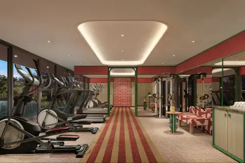 D Condo Vite fully equipped fitness center with cardio machines, weight equipment, mirrored walls, and garden views