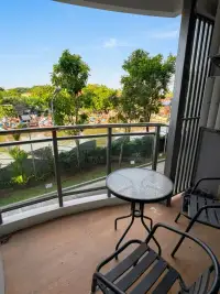 1 Bedroom Condo for Sale at Whale Marina private balcony with table and chairs overlooking marina canal