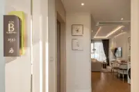 1 Bedroom Condo for Sale at Seaspire Jomtien Type B 1 bedroom 38.65 sqm unit signage at entrance hallway leading to living room