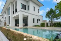 4 Bedroom House for Sale in The Palm Grandio's modern kitchen with island