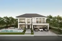 4 Bedroom House for Sale at Arcade Autograph two-storey exterior with private pool, covered carport and landscaped garden in Pattaya