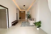 3 Bedroom House for Sale at The Flow Pong - Mabprachan modern facade with covered carport, paved driveway and decorative fence