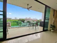 1 Bedroom Condo for Sale at The Park Jomtien private balcony with dining table and panoramic city skyline