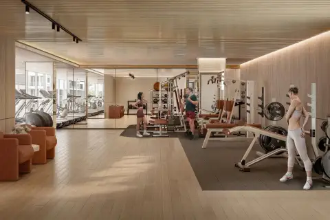 Avenue Boutique Pattaya: Contemporary fitness center with various exercise machines and wooden accents.