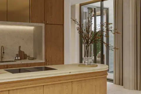 4 Bedroom House for Sale at Solava Pattaya close-up of kitchen island with induction hob, stone countertop, and lit backsplash niche