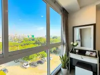 1 Bedroom Condo for Sale at Novana Residence bedroom window view of city skyline and construction cranes