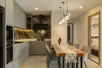 2 Bedroom Condo for Sale at Zensiri Estates and Residences modern kitchen with marble backsplash and wood dining table for six