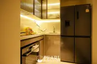 2 Bedroom Condo for Sale in Arom Jomtien master bedroom with ensuite bathroom
