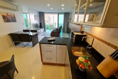 2 Bedroom Condo for Sale & Rent at Laguna Heights kitchen island with granite counter overlooking dining and living space