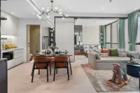 1 Bedroom Condo for Sale at Once Wong Amat: open-plan living, dining, and kitchen area with bedroom visible in the background.