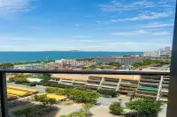 1 Bedroom Condo for Rent at Copacabana Beach Jomtien high-floor balcony view overlooking Jomtien cityscape and blue sea