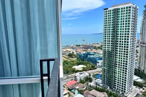 2 Bedroom Condo for Sale at The Twin Tower Jomtien Beach Pattaya high-floor balcony view of Jomtien Beach skyline and turquoise sea