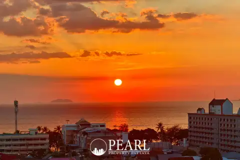 1 Bedroom Condo for Sale in Riviera Ocean Drive master bedroom with king-size bed and balcony access