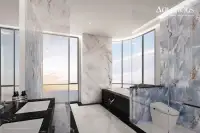 3 Bedroom Condo for Sale at Aquarous Jomtien Pattaya luxury marble bathroom with soaking tub and floor-to-ceiling sea-view windows