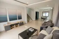 3 Bedroom House for Sale at Patta Define open-plan living room with staircase and dining area