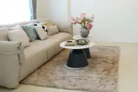 3 Bedroom House for Sale at Phonthep Garden Ville 2 close-up of beige sofa with cushions and marble-top coffee tables on rug
